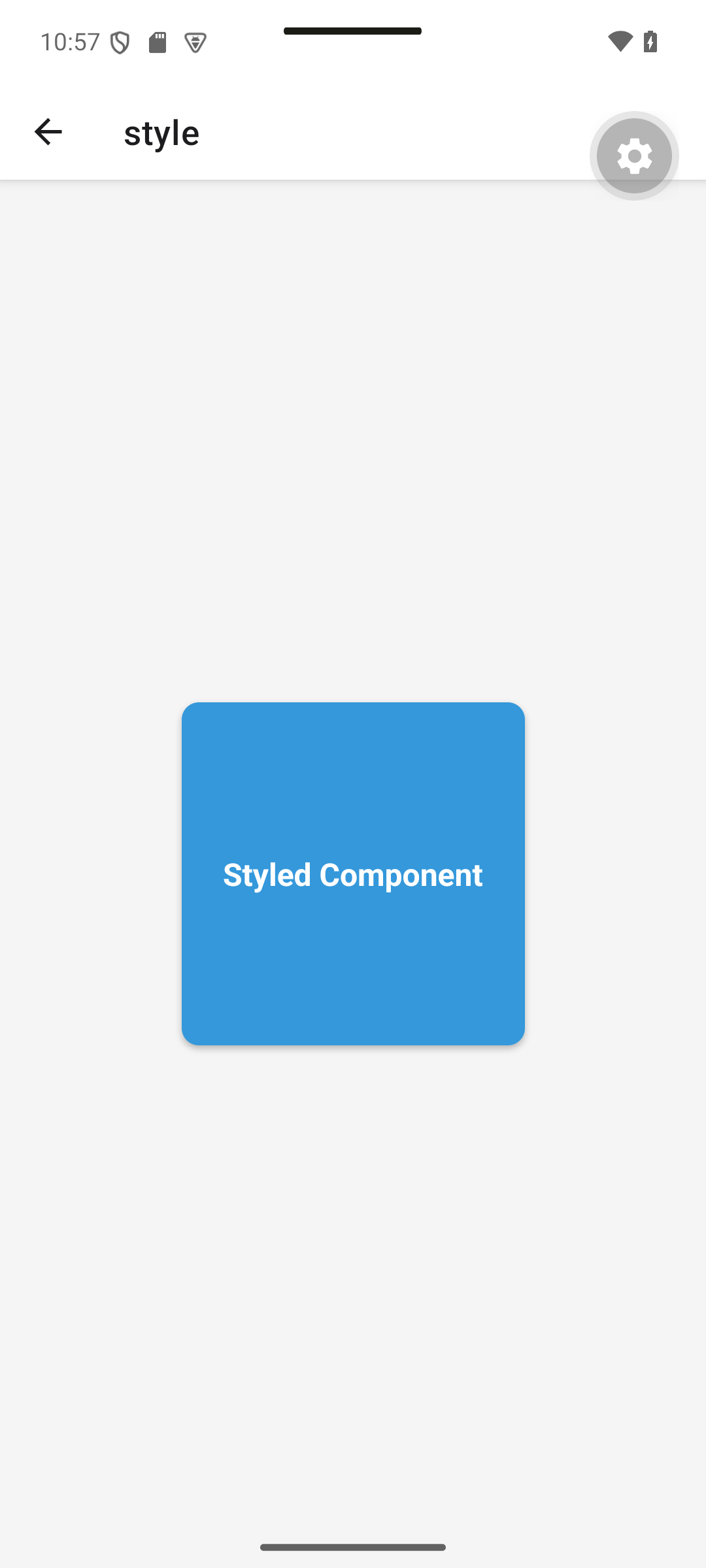 React Native: A blue square with rounded corners, a shadow and centered white text.